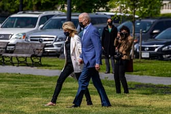 WASHINGTON, DC - APRIL 24: First lady Jill Biden and  U.S. President Joe Biden walk on the ellipse to Marine One on April 24, 2021 in Washington, DC. U.S. President Joe Biden and First lady Jill Biden will spend the weekend in Delaware.  (Photo by Tasos Katopodis/Getty Images)