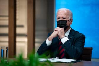 WASHINGTON, DC - APRIL 22: U.S. President Joe Biden listens during a virtual Leaders Summit on Climate with 40 world leaders in the East Room of the White House April 22, 2021 in Washington, DC. President Biden pledged to cut greenhouse gas emissions by half by 2030. (Photo by Al Drago-Pool/Getty Images)