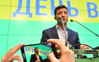 Ukrainian comedian and presidential candidate Volodymyr Zelensky speaks to the media during press conference at his campaign headquarters in Kiev on April 21, 2019,  after the announcement of the first exit poll results in the second round of Ukraine's presidential election, that showed him as the winner. - The comedian with no political experience won a landslide victory in Ukraine's presidential election, exit polls showed, dealing a stunning rebuke to the country's political establishment.  Volodymyr Zelensky, whose only previous political role was playing the president in a TV show, trounced incumbent Petro Poroshenko by taking 73 percent of the vote, according to exit polls conducted by several think tanks. (Photo by Genya SAVILOV / AFP) (Photo by GENYA SAVILOV/AFP via Getty Images)