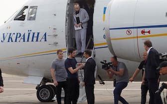 KIEV, UKRAINE - SEPTEMBER 07: Ukrainian President Volodymyr Zelensky welcomes recently exchanged Ukrainian prisoners who jailed in Russia at Boryspil International Airport in Kiev, Ukraine on September 07, 2019. Russia and Ukraine exchanged 70 prisoners after intense negotiations. Thirty-five people from each side, including 24 Ukrainian sailors who were detained in the incident near the Sea of Azov last November by Russia, and Russian journalist Kirill Vyshinsky convicted of espionage, were freed.





 (Photo by Vladimir Shtanko/Anadolu Agency via Getty Images)