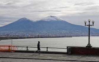The snow-covered Vesuvius visible from the city to the slopes of the volcano in Naples, Southern Italy, 20 March 2021. Eve of the first day of spring with snow on Vesuvius in the Neapolitan area and also in the areas south of Salerno.  ANSA / CIRO FUSCO