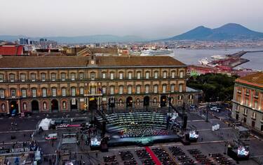 A panoramic view of Piazza del Plebiscito in Naples with the stage set up for the representation of the 'Tosca', opening, outdoors due to the pandemic from Covid- 19 , of the 2020 season of the San Carlo Theater, 23 July 2020 ANSA / CIRO FUSCO