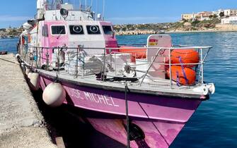 The rescue ship Louise Michel from the namesake NGO, financed by street-artist Banksy, is moored at the port of Lampedusa, Sicily, 26 March 2023. Activists aboard the ship, currently carrying around 180 migrants rescued at sea, denounced on 26 March that they were being prevented to go back at sea but that no official explanation had yet been given by Italian authorities. EPA/ELIO DESIDERIO