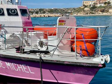The rescue ship Louise Michel from the namesake NGO, financed by street-artist Banksy, is moored at the port of Lampedusa, Sicily, 26 March 2023. Activists aboard the ship, currently carrying around 180 migrants rescued at sea, denounced on 26 March that they were being prevented to go back at sea but that no official explanation had yet been given by Italian authorities. EPA/ELIO DESIDERIO