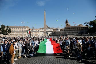 A big Italian flag (the Tricolore) on the occasion of the event organized by the center-right on the occasion of the Italy's Republic Day in the centre of Rome, Italy, 02 June 2020.
ANSA/FABIO FRUSTACI