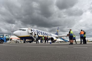 SOUTHEND-ON-SEA, ENGLAND  - JULY 01: Passengers board Ryanair flight FR2190 to Malaga at London Southend Airport on July 1, 2020 in Southend-on-Sea, England. The airport opened its doors today for the first passenger holiday flight since the coronavirus pandemic lockdown to Malaga with Ryanair. The flight FR2190 left with 144 passengers on board. (Photo by John Keeble/Getty Images)