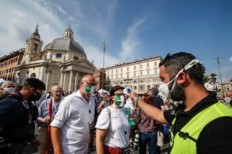 People gather during an event organized by the center-right wing parties at Piazza del Popolo in Rome, Italy, 04 July 2020.
ANSA/ GIUSEPPE LAMI