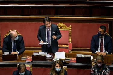 Prime minister Giuseppe Conte (C) next to Roberto Gualtieri (L), minister of Economy, and Luigi Di Maio (R), minister of Foreign Affairs, as he delivers a speech at the Senate on Recovery Fund, Rome, Italy, 22 July 2020. ANSA/RICCARDO ANTIMIANI