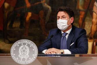 Italian Prime Minister, Giuseppe Conte, attends a press conference at Chigi Palace in Rome, Italy, 03 December 2020. Conte's cabinet approved a draft decree banning travel at Christmas at a meeting overnight in a bid to stop the festive season feeding a third wave of Coronavirs COVID-19 contagion, sources said Thursday. According to the draft decree, which is expected to be definitively approved after talks with Italy's regional government, movement between regions will be banned from December 21 until the Epiphany national holiday on January 6.?
ANSA/GIUSEPPE LAMI