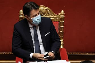 Giuseppe Conte, Italy's prime minister, listens during a debate in the Senate in Rome, Italy, on Tuesday, Jan. 19, 2021. Prime Minister Giuseppe Conte waged a charm offensive Tuesday in the Italian Senate ahead of a vote that will decide whether his coalition can survive. Alessia Pierdomenico/Bloomberg/Pool/Ansa