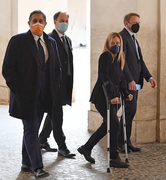 Giovanni Toti (Cambiamo. L), and President of the Brothers of Italy party (Fratelli d'Italia, FdI) Giorgia Meloni, arrive for a meeting with Italian President Sergio Mattarella at the Quirinale Palace for the first round of formal political consultations following the resignation of Prime Minister Giuseppe Conte, in Rome, Italy, 29 January 2021.  ANSA/ ETTORE FERRARI / POOL