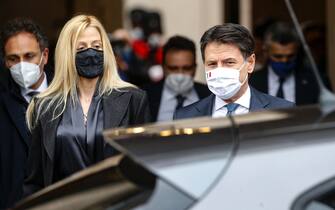 Former Premier Giuseppe Conte with Olivia Paladino after the handover ceremony with the new Prime Minister Mario Draghi at Chigi Palace, the premier's office, in Rome, Italy, 13 February 2021. ANSA/FABIO FRUSTACI