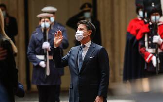 Former Premier Giuseppe Conte waves after the handover ceremony with the new Prime Minister Mario Draghi at Chigi Palace, the premier's office, in Rome, Italy, 13 February 2021. ANSA/FABIO FRUSTACI