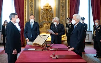 Italian President Sergio Mattarella (R) with Italian Prime Minister Mario Draghi (L) during new government swearing-in ceremony at Quirinal Palace, Rome, 13 February 2021. ANSA/FRANCESCO AMMENDOLA/QUIRINALE PRESS OFFICE ++ NO SALES, EDITORIAL USE ONLY +++
