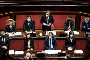 Italian premier Mario Draghi (Up-Center) during his address to the Senate ahead of a confidence vote, in Rome, Italy, 17 February 2021. ROBERTO MONALDO/LAPRESSE/POOL/ANSA