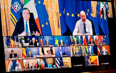 Italian Prime Minister, Mario Draghi, attends a EU Council two-days video conference on the COVID-19 pandemic, 25 February 2021. EU leaders will take stock of the epidemiological situation. They will continue working to coordinate the response to the COVID-19 pandemic, focusing in particular on the authorisation, production and distribution of vaccines and the movement of persons.
ANSA/CHIGI PALACE PRESS CONFERENCE/FILIPPO ATTILI
+++ ANSA PROVIDES ACCESS TO THIS HANDOUT PHOTO TO BE USED SOLELY TO ILLUSTRATE NEWS REPORTING OR COMMENTARY ON THE FACTS OR EVENTS DEPICTED IN THIS IMAGE; NO ARCHIVING; NO LICENSING +++
