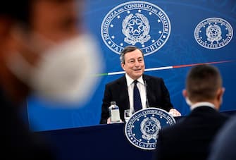Italian Prime Minister Mario Draghi attends a press conference after the Cabinet Meeting on economic measures to fight the Covid-19 pandemic crisis, Rome, Italy, 19 March 2021. ANSA/RICCARDO ANTIMIANI