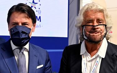 Beppe Grillo (R) with prime minister Giuseppe Conte (L) during the presentation of the 2019 Blue Book at the Customs and Monopolies Agency, Rome, Italy, 11 September 2020. ANSA/RICCARDO ANTIMIANI