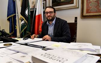 Mayor of L'Aquila, Pierluigi Biondi poses in his office on February 8, 2018 in L'Aquila, a town in central Italy continuing the reconstruction effort following the 2009 earthquake. 

Nine years after a devastating earthquake, L'Aquila is struggling to return to life, but the inhabitants of this city of central Italy thank Silvio Berlusconi, back on the occasion of the legislative elections of March 4, for having quickly given them a roof. / AFP PHOTO / TIZIANA FABI        (Photo credit should read TIZIANA FABI/AFP via Getty Images)