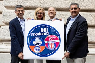 Maurizio Lupi, Michaela Biancofiore, Lorenzo Cesa e Giovanni Toti durante la presentazione della lista e del simbolo dei moderati uniti a sostegno della coalizione del centrodestra alle prossime elezioni politiche del 25 settembre, Roma, 11 agosto 2022. 
ANSA/MASSIMO PERCOSSI