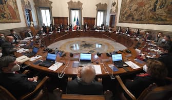Italy's new Prime Minister Mario Draghi (C) holds the first council of Ministers at Chigi Palace in Rome, Italy, 13 February 2021.   ANSA/ ETTORE FERRARI/pool