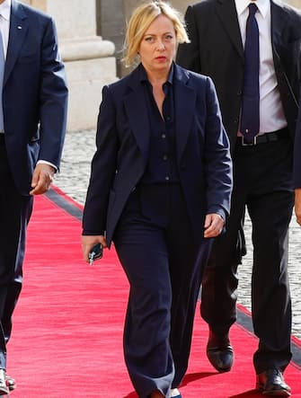 Leader of  Fratelli d'Italia  party Giorgia Meloni (C) arrives for a meeting with Italian President Sergio Mattarella for the first round of formal political consultations for new government at the Quirinale Palace in Rome, Italy, 21 October 2022. ANSA/FABIO FRUSTACI