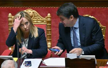 Italian premier Giorgia Meloni (L) and Italian Minister for European Affairs, Territorial Cohesion and PNRR Raffaele Fitto during the communications ahead of the European Council of 23 and 24 March, in the Senate hall, Rome, Italy, 21 March 2023. ANSA/ETTORE FERRARI