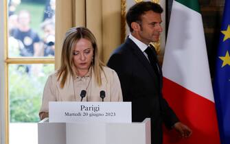 epa10702107 French President Emmanuel Macron (R) and Italy's Prime Minister Giorgia Meloni (L) arrive for a joint press conference at the Elysee Palace in Paris, France, 20 June 2023. Giorgia Meloni is on an official visit to France.  EPA/LUDOVIC MARIN / POOL MAXPPP OUT