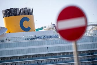 epaselect epa08179644 The cruise ship 'Costa Smeralda' is seen anchored in the port of Civitavecchia, northwest of Rome , Italy, 30 January 2020. Over six thousand tourists were blocked in the cruise ship after the vast liner was placed on lockdown over two suspected cases of the coronavirus. Samples from a Chinese couple were sent for testing after three doctors and a nurse boarded the Costa Crociere ship to tend to a woman running a fever, the local health authorities said. Costa Crociere, the company owning the cruiser, confirmed that the ship, carrying some seven thousand people including the crew, was in lockdown.  EPA/MASSIMO PERCOSSI