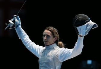 epa03322823 Valentina Vezzali of Italy celebrates her victory over Hee Hyun Nam of Korea following their Bronze medal fight at the Women's Foil Individuals competition during the London 2012 Olympic Games.  in London, Britain, 28 July 2012  EPA/SERGEI ILNITSKY