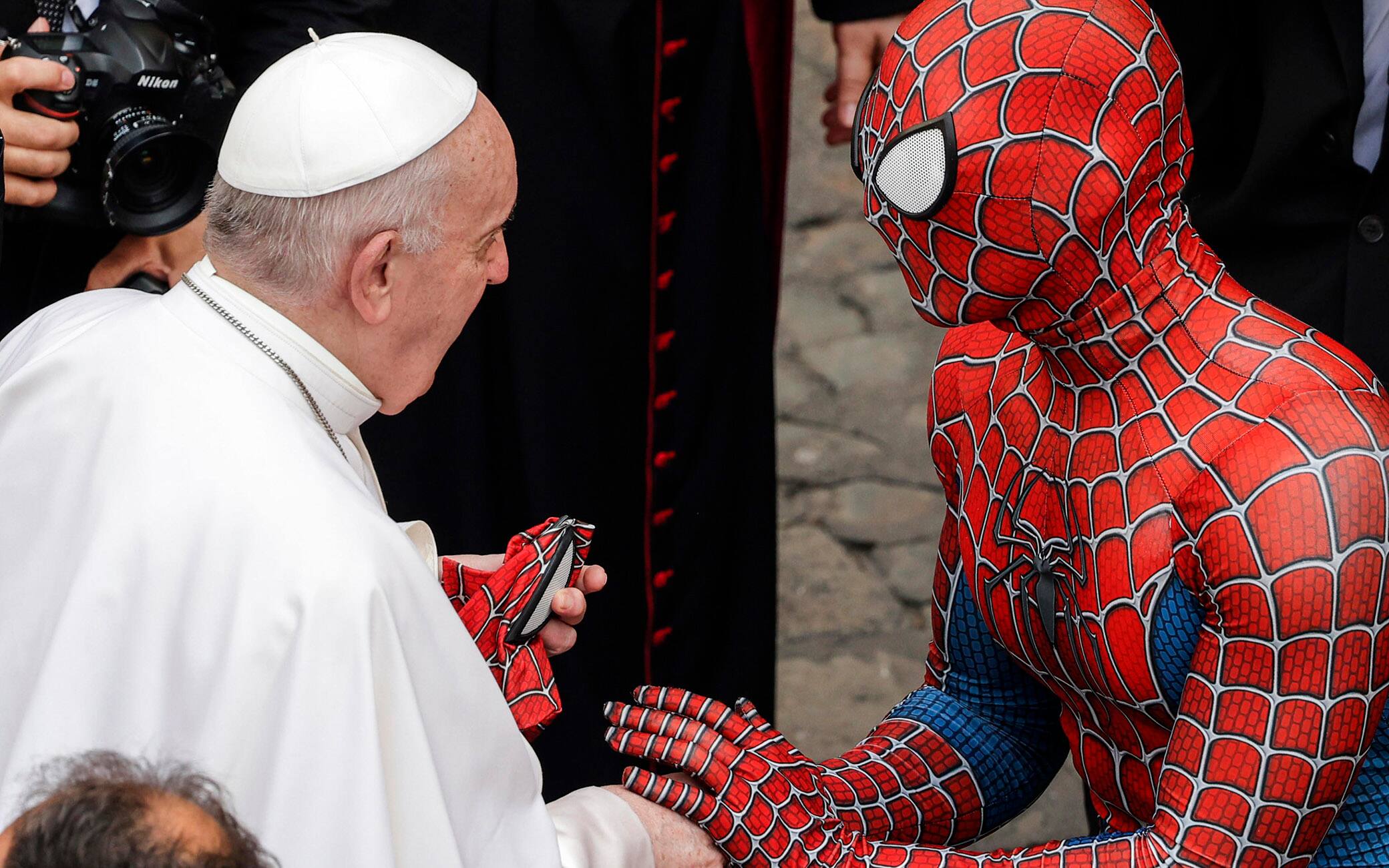 A man in a ‘Spiderman’ suit attendes weekly General Audience of Pope Francis in the San Damaso courtyard, Vatican City, 23 June 2021 ANSA/GIUSEPPE LAMI