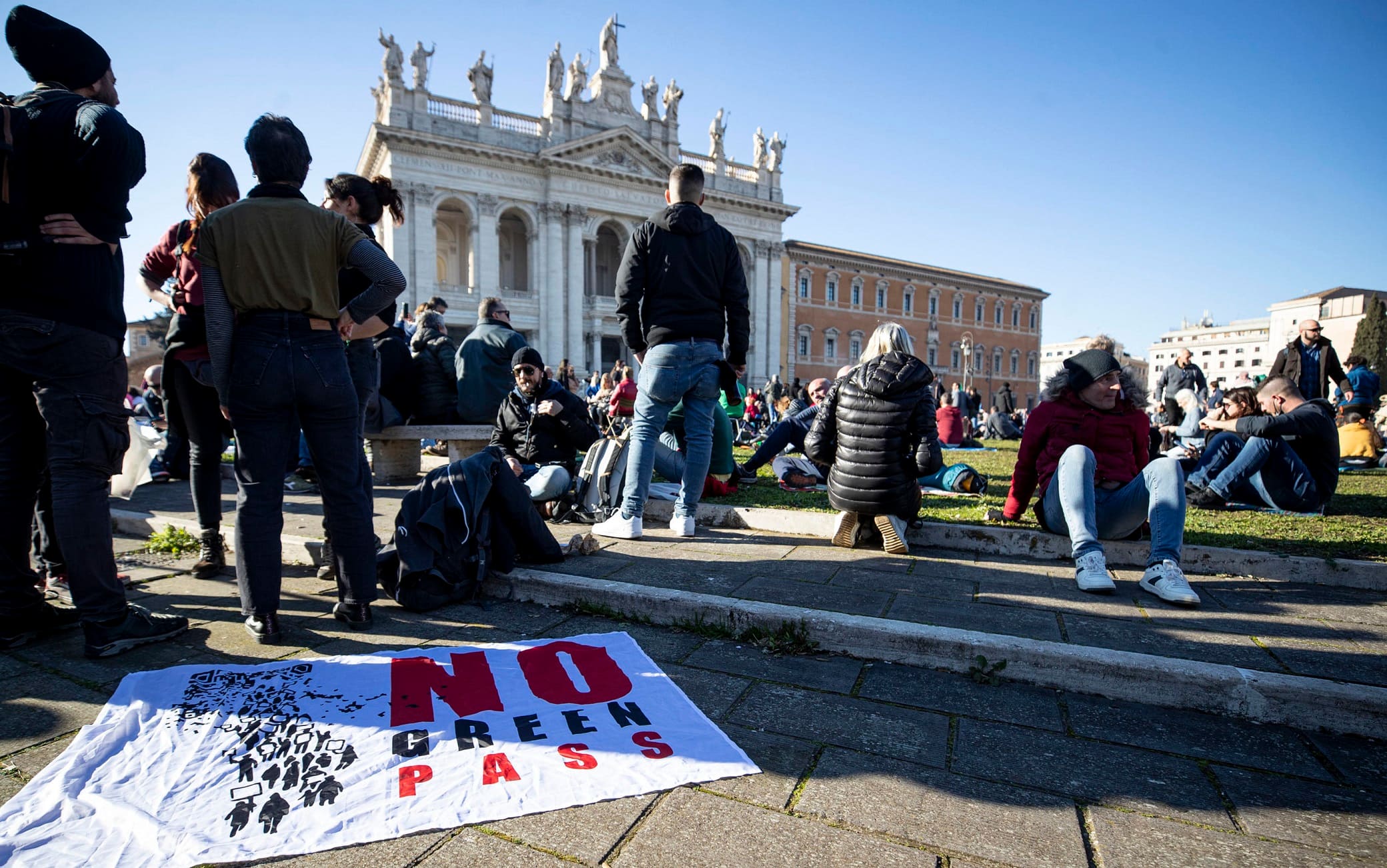 People gather during the 'No Vax and No Green Pass' protest at San Giovanni square, in Rome, Italy, 15 January 2022. In Italy it is now necessary to have the so-called Super Green Pass, which shows that a person is vaccinated for COVID-19 or has recovered from it on the last six months, to access bars, restaurants, hotels and travel on buses, subways, trains, planes and ships. Furthermore, the government has also made the Super Green Pass obligatory for all over-50s as they are considered especially vulnerable if they contract the virus. 
ANSA/MASSIMO PERCOSSI