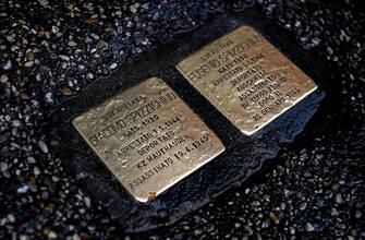 The two stumbling blocks in memory of the deportees Eugenio and Giacomo Spizzichino in the Trastevere district restored after the damage, Rome, 1 November 2023. ANSA/RICCARDO ANTIMIANI