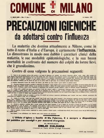 699912813 About the Spanish flu epidemic of 1918, manifesto posted by the City of Milan to deal with the serious outbreak which had attacked the population already weakened by the hardships of war. The long list of preventive measures bears the signature of the Mayor Emilio Caldara. Typographic poster, Italy, Milan 1918. (Photo by Fototeca Gilardi/Getty Images)