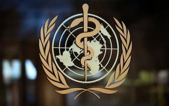 A photo taken on February 24, 2020 shows the logo of the World Health Organization (WHO) at their headquarters in Geneva. - Fears of a global coronavirus pandemic deepened on February 24, 2020 as new deaths and infections in Europe, the Middle East and Asia triggered more drastic efforts to stop people travelling. (Photo by Fabrice COFFRINI / AFP) (Photo by FABRICE COFFRINI/AFP via Getty Images)