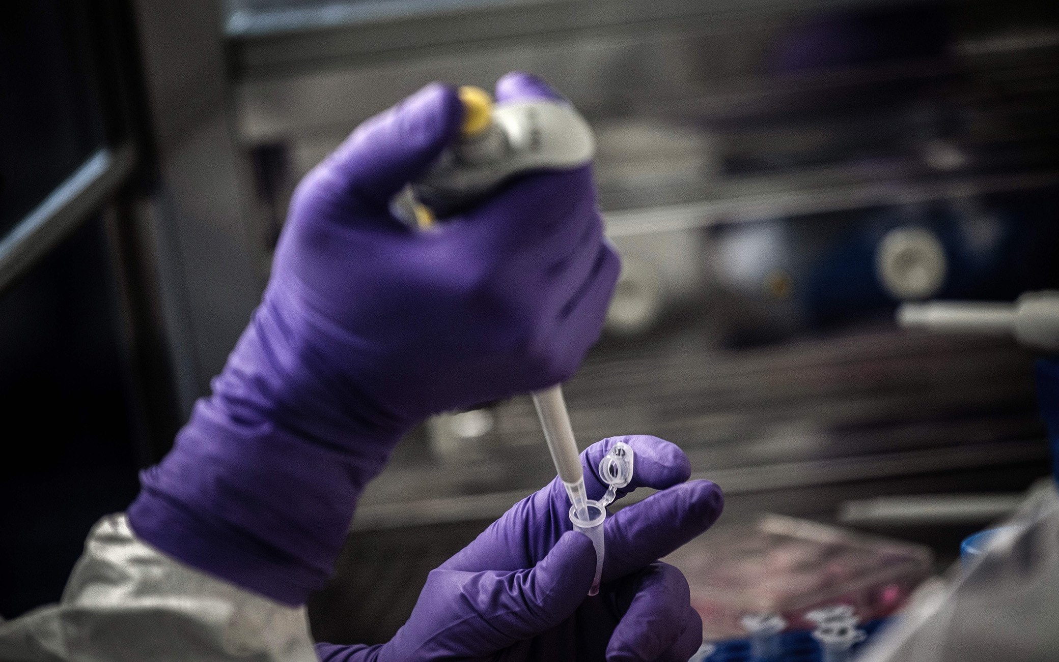 1198900287 A scientist is at work in the VirPath university laboratory, classified as "P3" level of safety, on February 5, 2020 as they try to find an effective treatment against the new SARS-like coronavirus, which has already caused more than 560 deaths. - When most are busy developing vaccines or testing the few anti-virals available, VirPath will go after drugs used for diseases that have nothing to do with a respiratory infection such as 2019-nCoV. (Photo by JEFF PACHOUD / AFP) (Photo by JEFF PACHOUD/AFP via Getty Images)