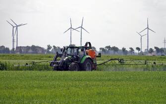 epa07419824 (FILE) - A farmer on a tractor sprays farmland near Neuharlingersiel, northern Germany, 15 June 2018 (reissued 07 March 2019). The EU Court of Justice's General Court in Luxembourg has ruled on 07 March 2019 that the European Food Safety Authority (EFSA), the EU food watchdog, must disclose studies on the toxicity and carcinogenic properties of glyphosate, the world's most commonly used herbicide that sparked controversy in the EU over safety evaluations.  EPA/MAURITZ ANTIN