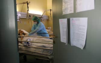 settore Covid non grave della RSA di Gussago (bs) A nurse takes care of one of the patients in the Covid non-serious sector of the RSA (Residenze Sanitaria Assististici) of the Requested Foundation of Gussago detachment of the civilian of Brescia, Italy, 14 April 2020. Countries around the world are taking measures to stem the widespread of the SARS-CoV-2 coronavirus which causes the COVID-19 disease. Ansa Filippo Venezia