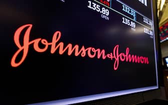 epa09041618 A screen shows the logo for the pharmaceutical company Johnson and Johnson on the floor of the New York Stock Exchange in New York, New York, USA, 29 May 2019 (reissued 27 February 2021). The Johnson and Johnson new single shot Covid-19 vaccine has been approved for use in the US by the US Food and Drug Administration on 27 February 2021.  EPA/JUSTIN LANE *** Local Caption *** 55233447