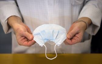 TOPSHOT - An employee controls health protection masks in a production chain of the Kolmi-Hopen company's factory, on February 1, 2020 in Saint-Barthelemy-d'Anjou, western France. - The company indicated receiving hundreds of millions of orders for health protection masks due to cases of coronavirus that emerged in a market in the central Chinese city of Wuhan. The coronavirus outbreak has so far killed more than 250 people and infected thousands in mainland China and beyond and has forced governments around the world to take drastic measures. (Photo by Loic VENANCE / AFP) (Photo by LOIC VENANCE/AFP via Getty Images)