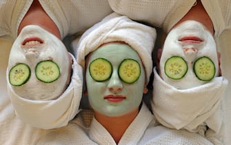 Women undergo facial beauty treatments at the spa on Daydream Island in the Whitsundays archipelago off Queensland on July 12, 2010. Australians are escaping the unusually cold and wet winter in the south of the country to holiday on tropical islands off the eastern seaboard.  AFP PHOTO / Torsten BLACKWOOD (Photo credit should read TORSTEN BLACKWOOD/AFP via Getty Images)