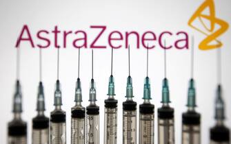 Medical syringes are pictured in front of the AstraZeneca logo in this photo illustration, taken in Kyiv, Ukraine on May 13, 2021. The World Health Organization has approved for emergency use of China's Sinopharm COVID-19 coronavirus vaccine, and in total, WHO has now registered 6 vaccines for SARS-CoV-2, as media reported. 
 (Photo by Alex Chitaro/Sipa USA)