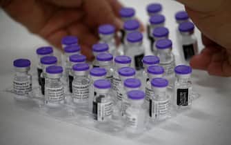 Vials of Pfizer COVID-19 vaccine are prepared for an inoculation drive in Marikina City, Metro Manila, Philippines, 20 May 2021. The Department of Health is working with local government units to suspend early announcements of vaccine brands available for scheduled vaccination dates and instead inform citizens right before inoculation in order to get consent. The move is aimed at encouraging equal confidence in all available vaccines and avoid overcrowding in inoculation centers caused by brand preference.  ANSA/ROLEX DELA PENA