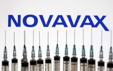 Medical syringes are pictured in front of the Novavax logo in this photo illustration, taken in Kyiv, Ukraine on May 13, 2021. The World Health Organization has approved for emergency use of China's Sinopharm COVID-19 coronavirus vaccine, and in total, WHO has now registered 6 vaccines for SARS-CoV-2, as media reported. 
 (Photo by Alex Chitaro/Sipa USA)