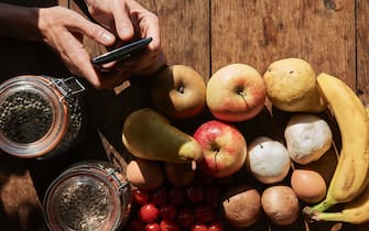 New smartphone apps help manage many elements of our daily lives, such as having a better, healthier diet, or regulating appetite in the case of eating disorders (anorexia, boulimia etc.). (Photo by: BSIP/Universal Images Group via Getty Images)