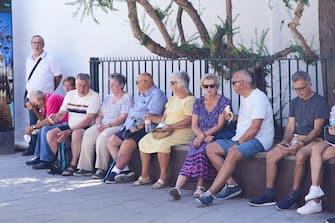 SEVILLE ANDALUSIA, SPAIN - JULY 07: Several elderly people take shelter from the heat on the first day of the second heat wave on July 7, 2022 in Seville (Andalusia, Spain). (Photo By Joaquin Corchero/Europa Press via Getty Images)