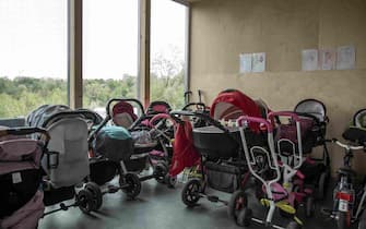 LVIV, UKRAINE, MAY 04: Strollers for babies are seen parking at the entry of a shelter for lone mothers and pregnant women in Lviv, Ukraine on May 04, 2023. Single mothers and pregnant women who have been displaced from war-torn cities across the country have found refuge in a temporary shelter in a safe house in Lviv. (Photo by Narciso Contreras/Anadolu Agency via Getty Images)