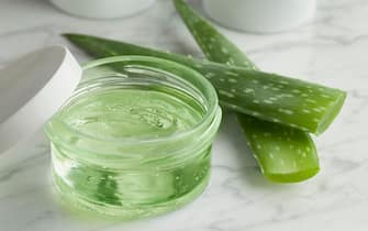 Aloe Vera gel in a glass jar for cosmetic use
