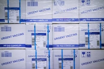 Detail of boxes of vaccines and products stored in cold storage racks before their shipment, at a French pharmaceutical company Sanofi's world distribution centre in Val-de-Reuil on July 10, 2020. (Photo by JOEL SAGET / AFP) (Photo by JOEL SAGET/AFP via Getty Images)