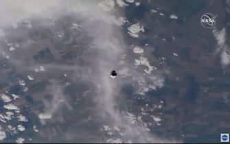 epa08455992 A handout video-grabbed still image made available by NASA on 31 May 2020 showing SpaceX Crew Dragon as seen from the International Space Station during the spacecrafts approach to the orbiting laboratory, 31 May 2020. NASA s SpaceX Demo-2 mission to the International Space Station with NASA astronauts Robert Behnken and Douglas Hurley on-board was launched from NASA's Kennedy Space Center in Cape Canaveral, Florida, USA, 30 May 2020.  EPA/NASA TV HANDOUT  HANDOUT EDITORIAL USE ONLY